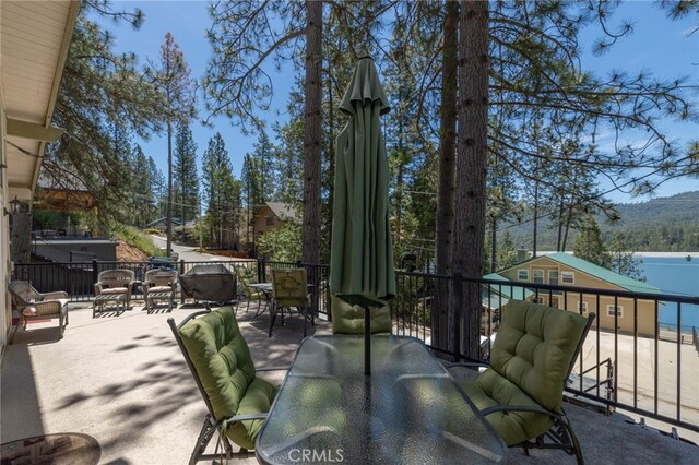 37731 Shoreline Dr, Bass Lake, CA 93604 - view of patio featuring outdoor dining space