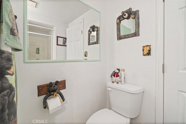37731 Shoreline Dr, Bass Lake, CA 93604 - bathroom featuring toilet and a shower