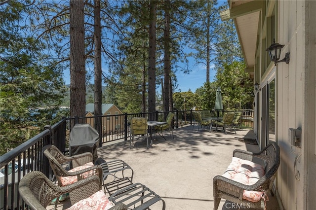 37731 Shoreline Dr, Bass Lake, CA 93604 - view of patio / terrace featuring outdoor dining space