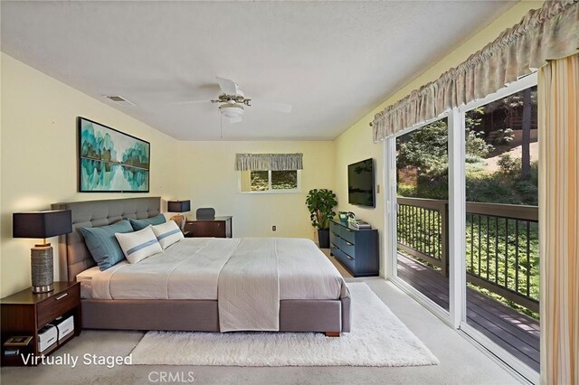 37731 Shoreline Dr, Bass Lake, CA 93604 - bedroom featuring access to outside, multiple windows, and a ceiling fan