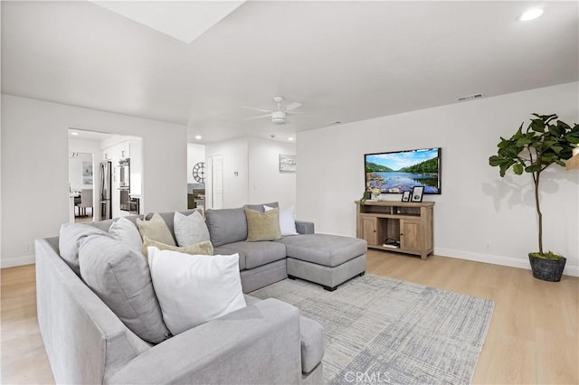 8426 Orange St, Downey, CA 90242 - living area with a ceiling fan, light wood-style flooring, and recessed lighting