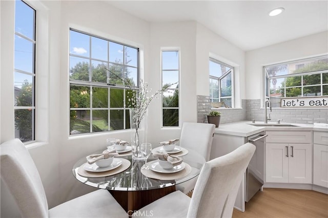 8426 Orange St, Downey, CA 90242 - dining area featuring plenty of natural light, light wood-type flooring, and recessed lighting
