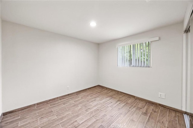 8426 Orange St, Downey, CA 90242 - spare room featuring light wood-type flooring and recessed lighting