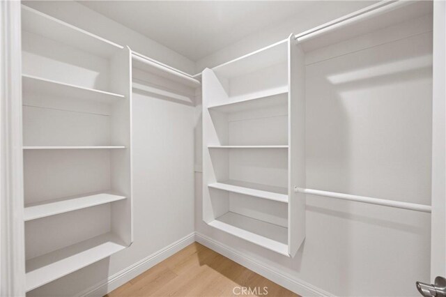 8426 Orange St, Downey, CA 90242 - spacious closet with wood finished floors