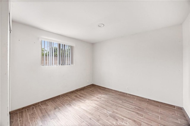 8426 Orange St, Downey, CA 90242 - empty room featuring wood finished floors and baseboards