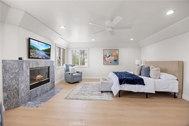 8426 Orange St, Downey, CA 90242 - bedroom with light wood-style floors, a fireplace, recessed lighting, and a ceiling fan