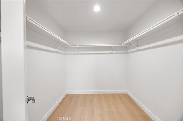 8426 Orange St, Downey, CA 90242 - spacious closet featuring wood finished floors