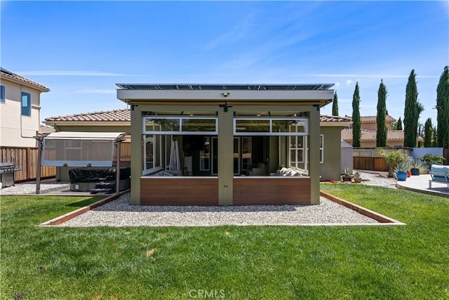 283 Katie Ct, Lakeport, CA 95453 - back of house featuring a sunroom, a tiled roof, and stucco siding