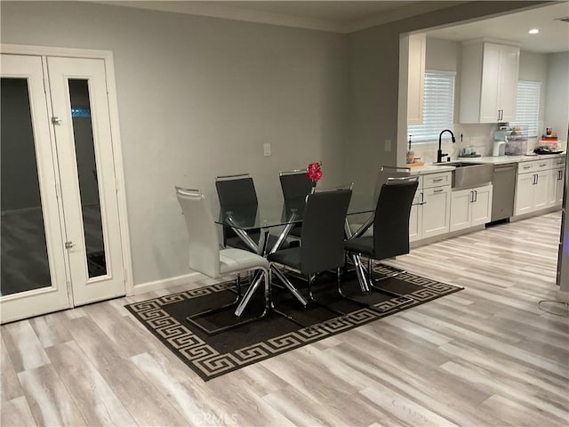 114 S Acacia Ave, Rialto, CA 92376 - dining space featuring light wood finished floors, recessed lighting, and ornamental molding