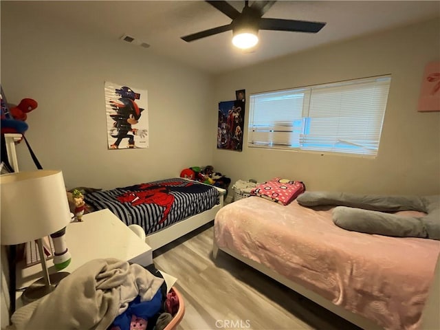114 S Acacia Ave, Rialto, CA 92376 - bedroom featuring wood finished floors and ceiling fan