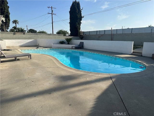 114 S Acacia Ave, Rialto, CA 92376 - view of swimming pool with a fenced backyard and a patio