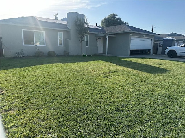114 S Acacia Ave, Rialto, CA 92376 - ranch-style home with an attached garage, stucco siding, a front lawn, and driveway