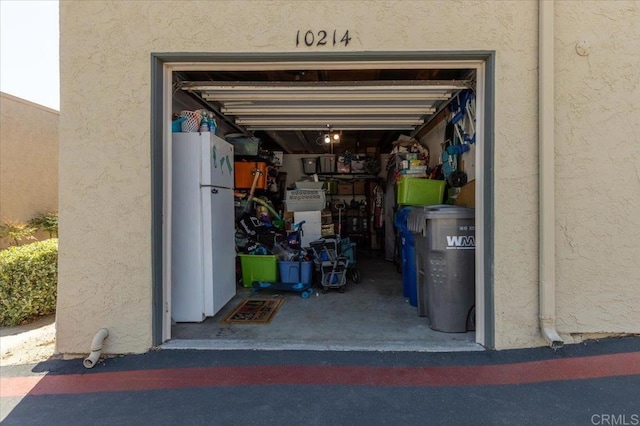 10214 Michala Pl, Santee, CA 92071 - garage with freestanding refrigerator
