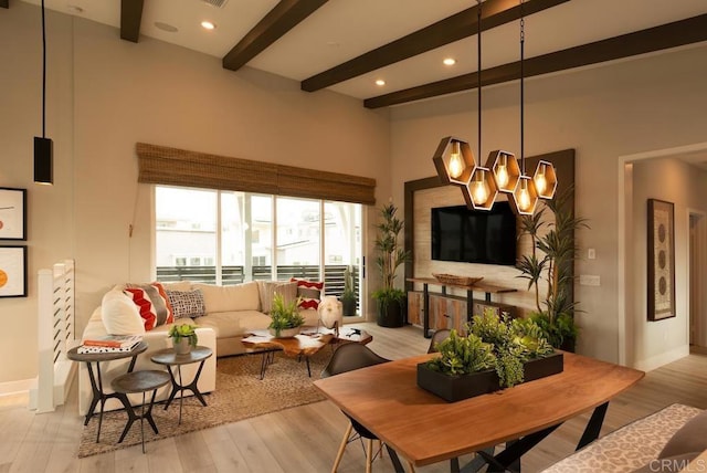14421 Segal Way, San Diego, CA 92126 - living room with beamed ceiling, light wood finished floors, a high ceiling, baseboards, and recessed lighting