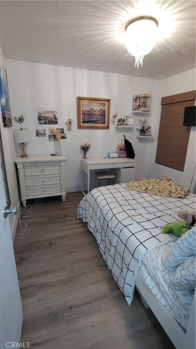 15343 Oakham Ct, Moreno Valley, CA 92551 - bedroom featuring wood finished floors and baseboards