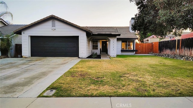 15343 Oakham Ct, Moreno Valley, CA 92551 - ranch-style home with a garage and driveway
