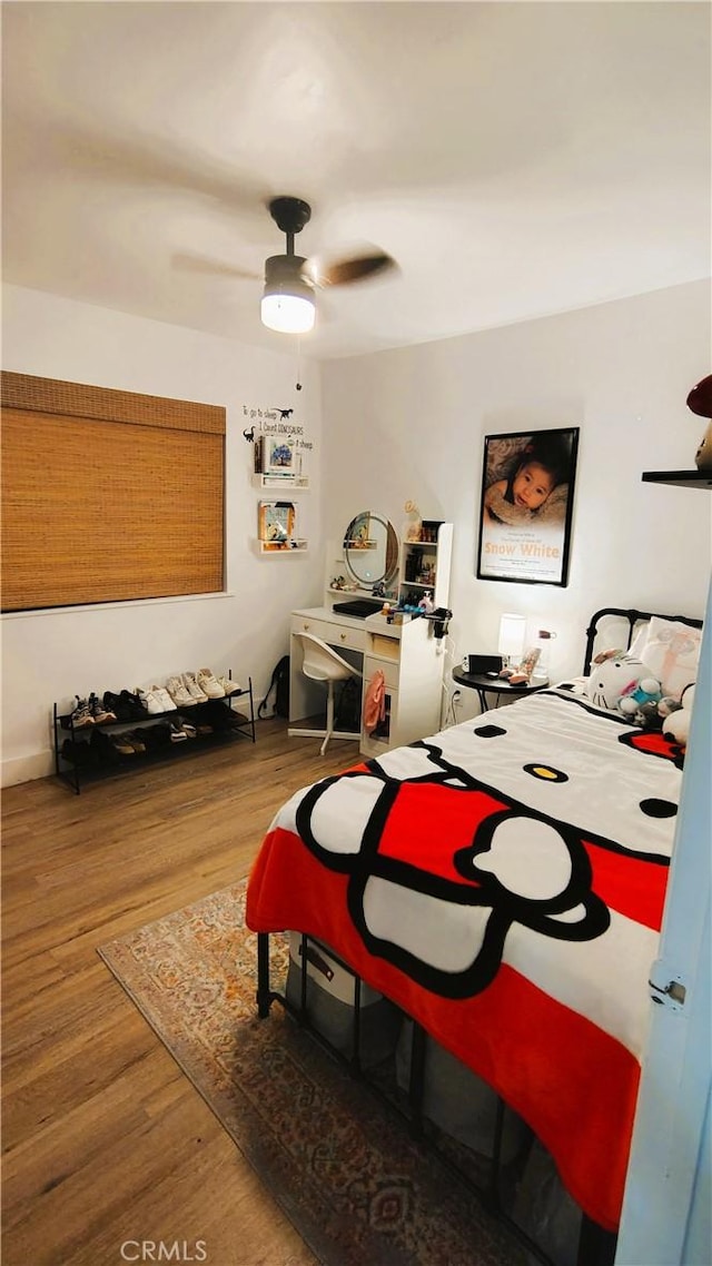 15343 Oakham Ct, Moreno Valley, CA 92551 - bedroom featuring wood finished floors and ceiling fan