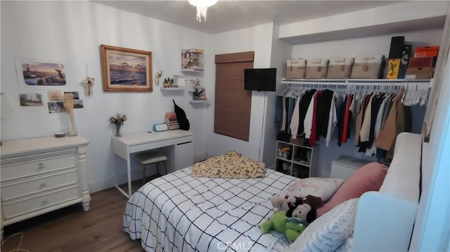 15343 Oakham Ct, Moreno Valley, CA 92551 - bedroom with wood finished floors and a closet