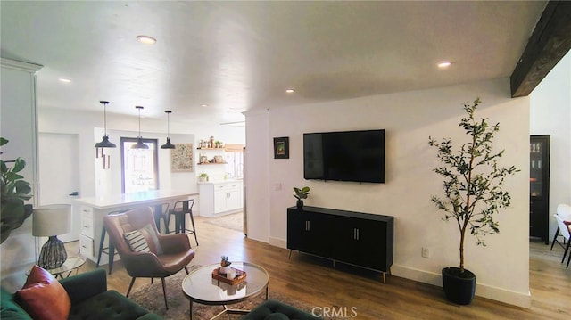 15343 Oakham Ct, Moreno Valley, CA 92551 - living area featuring light wood-style floors, recessed lighting, and baseboards