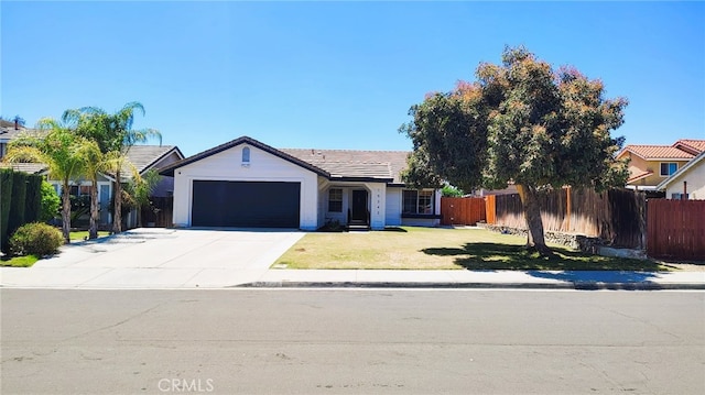 15343 Oakham Ct, Moreno Valley, CA 92551 - ranch-style home featuring a garage, driveway, and a tile roof