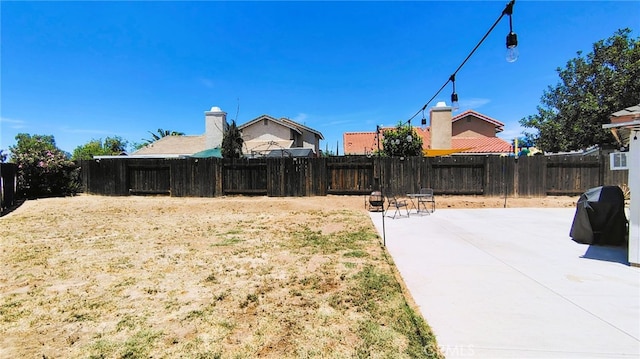 15343 Oakham Ct, Moreno Valley, CA 92551 - fenced backyard with a patio area