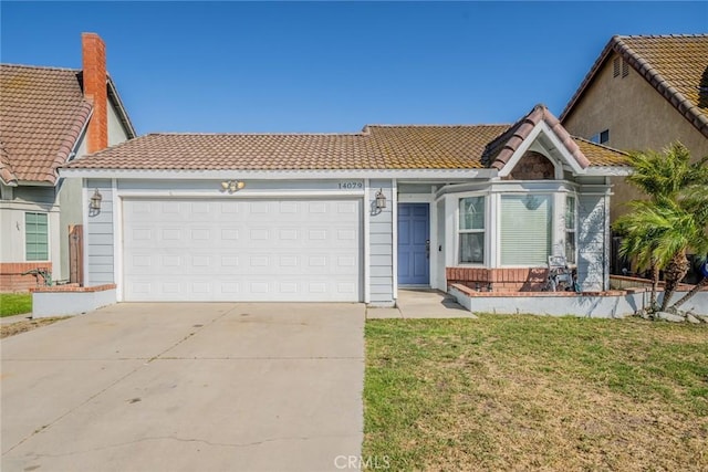 14079 El Camino Pl, Fontana, CA 92337 - view of front of home with a tiled roof, an attached garage, concrete driveway, a front yard, and stucco siding