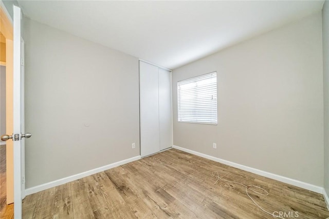 14079 El Camino Pl, Fontana, CA 92337 - empty room featuring light wood-style floors and baseboards