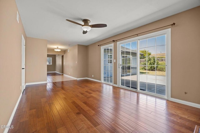 260 N Wake Forest Ave, Ventura, CA 93003 - empty room with ceiling fan, hardwood / wood-style floors, and baseboards