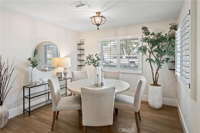 61 Bridgeport, Irvine, CA 92620 - dining room with wood finished floors, healthy amount of natural light, and baseboards