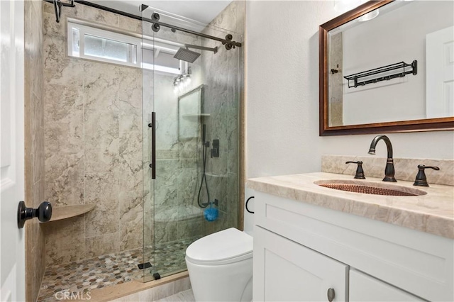 61 Bridgeport, Irvine, CA 92620 - bathroom with a shower stall, vanity, and toilet