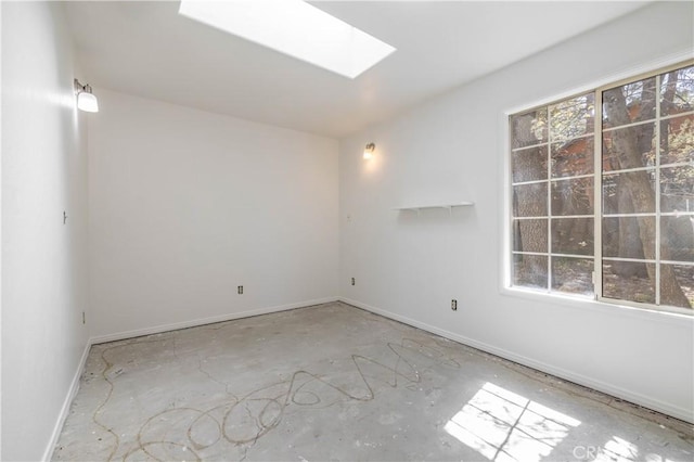 600 Moreno Ln, Sugarloaf, CA 92386 - empty room with plenty of natural light, a skylight, and baseboards
