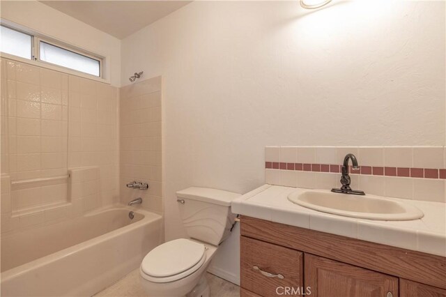 600 Moreno Ln, Sugarloaf, CA 92386 - bathroom featuring toilet, vanity, and bathing tub / shower combination