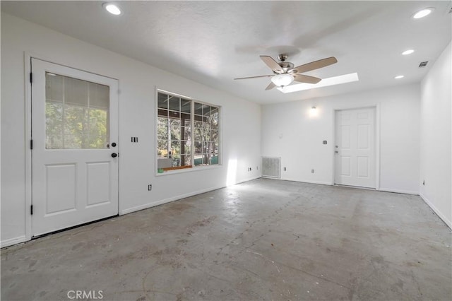600 Moreno Ln, Sugarloaf, CA 92386 - unfurnished living room featuring ceiling fan, concrete flooring, baseboards, and recessed lighting