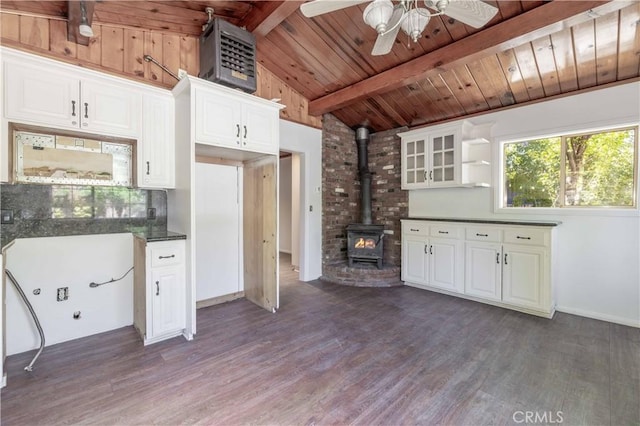 600 Moreno Ln, Sugarloaf, CA 92386 - kitchen with a wood stove, dark countertops, dark wood-type flooring, wood ceiling, and ceiling fan