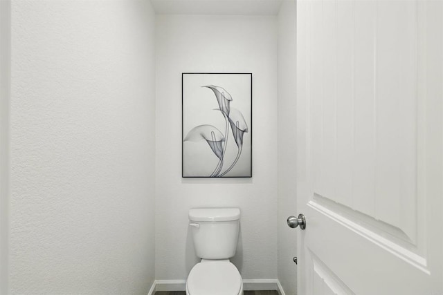 170 Montage Dr, Merced, CA 95348 - bathroom featuring toilet and baseboards