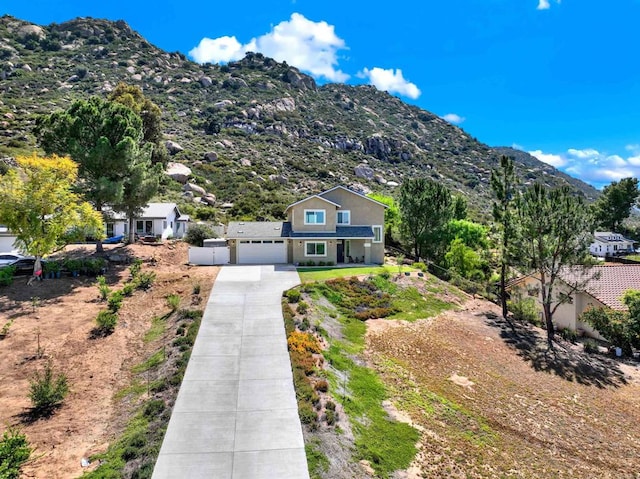 25034 Poderio Dr, Ramona, CA 92065 - view of front of house featuring driveway and a mountain view