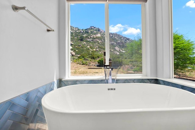 25034 Poderio Dr, Ramona, CA 92065 - bathroom with a freestanding bath and healthy amount of natural light
