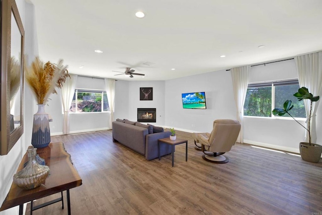 25034 Poderio Dr, Ramona, CA 92065 - living area with a glass covered fireplace, ceiling fan, baseboards, recessed lighting, and wood finished floors