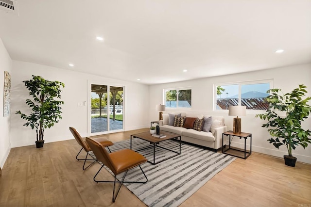 101 Coolwater Dr, San Diego, CA 92114 - living room featuring light wood-type flooring, recessed lighting, and baseboards