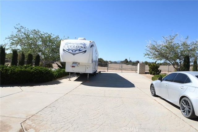 8250 Cataba Rd, Oak Hills, CA 92344 - view of car parking with a gate