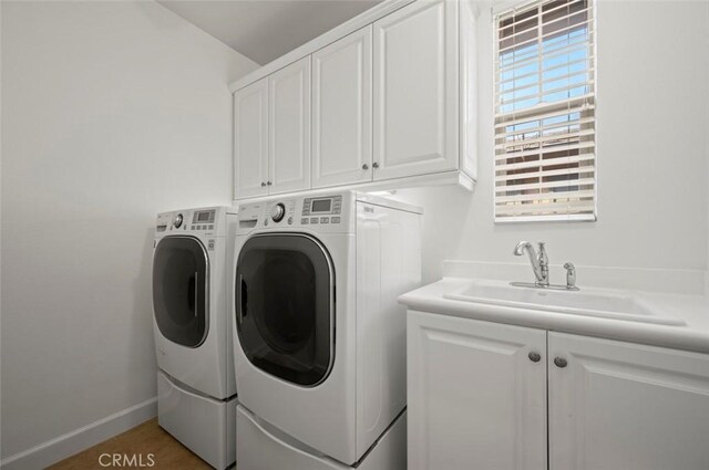 21 Land Bird, Irvine, CA 92618 - washroom with cabinet space, independent washer and dryer, and baseboards