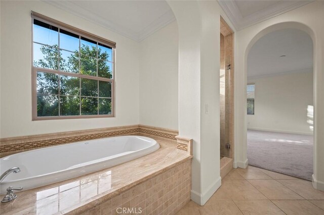 21 Land Bird, Irvine, CA 92618 - bathroom featuring crown molding, a stall shower, a bath, tile patterned floors, and baseboards