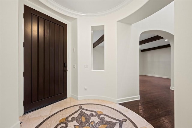 21 Land Bird, Irvine, CA 92618 - foyer with arched walkways, beam ceiling, baseboards, and wood finished floors