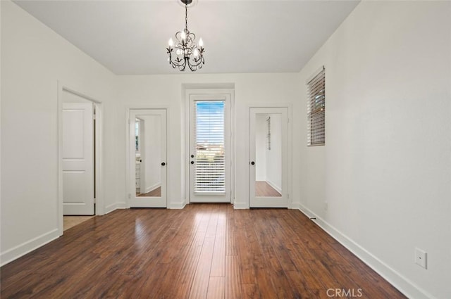 21 Land Bird, Irvine, CA 92618 - entryway featuring a chandelier, baseboards, and dark wood-style floors