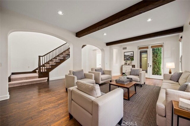 21 Land Bird, Irvine, CA 92618 - living room featuring arched walkways, stairs, wood finished floors, recessed lighting, and baseboards