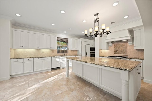 21 Land Bird, Irvine, CA 92618 - kitchen featuring white dishwasher, wall oven, a center island, crown molding, and a chandelier