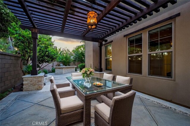 21 Land Bird, Irvine, CA 92618 - fenced backyard featuring a patio, a pergola, and outdoor dining area