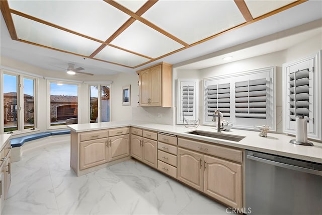 4026 Calle Lisa, San Clemente, CA 92672 - kitchen with dishwasher, a sink, light brown cabinets, a peninsula, and light marble finish floors