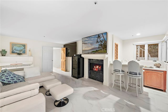 4026 Calle Lisa, San Clemente, CA 92672 - living room featuring a premium fireplace, light marble finish floors, and recessed lighting