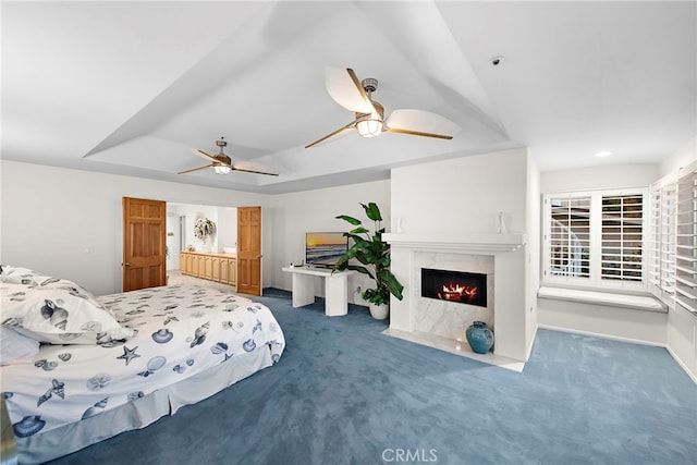 4026 Calle Lisa, San Clemente, CA 92672 - bedroom featuring carpet flooring, a raised ceiling, and a high end fireplace